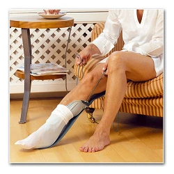 Pone medias Etac Largo Socky stocking aid long